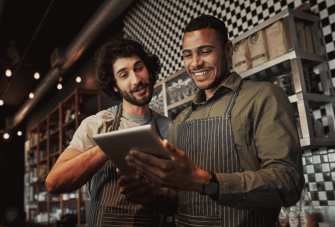 Coffee shop staff on tablet