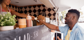 Food Truck Serving Customer Money