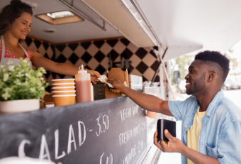 Food Truck Serving Customer Money