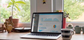 epos now reports on laptop coffee