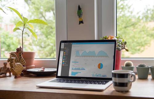 epos now reports on laptop coffee