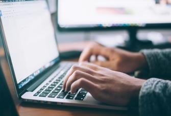 Laptop and hands