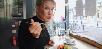 Woman eating salad